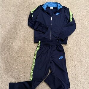 Nike Dark Blue Tracksuit with Bright neon Green Stripes, size 7